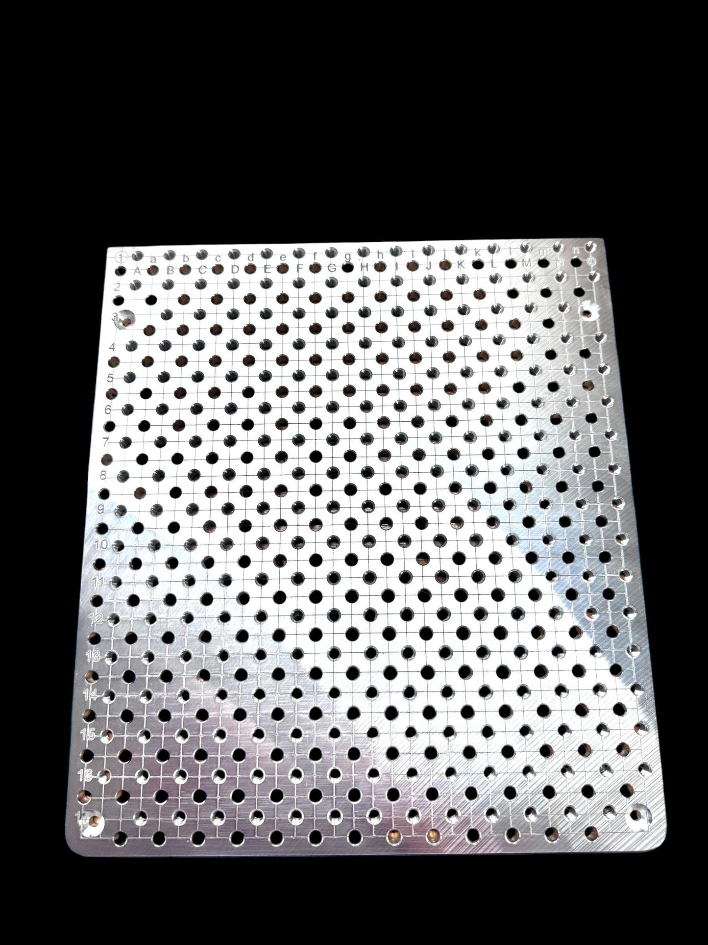 xTool F2 Ultra Jigmaker Fixture Plate with numerous precision holes for optimal laser setups.