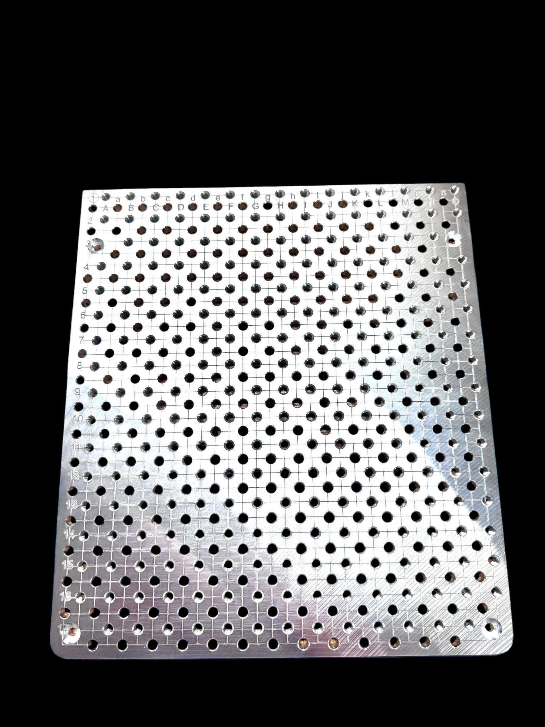 xTool F2 Ultra Jigmaker Fixture Plate with numerous precision holes for optimal laser setups.