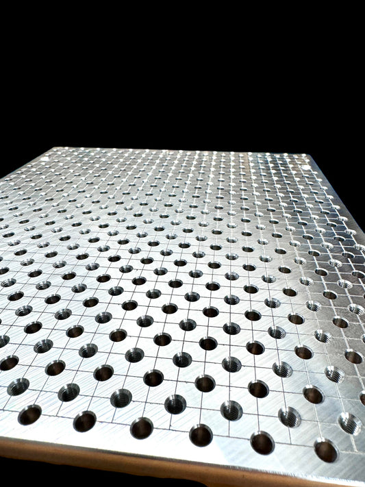 xTool F2 Ultra Jigmaker fixture plate with precision holes, ideal for accurate setups in laser applications.