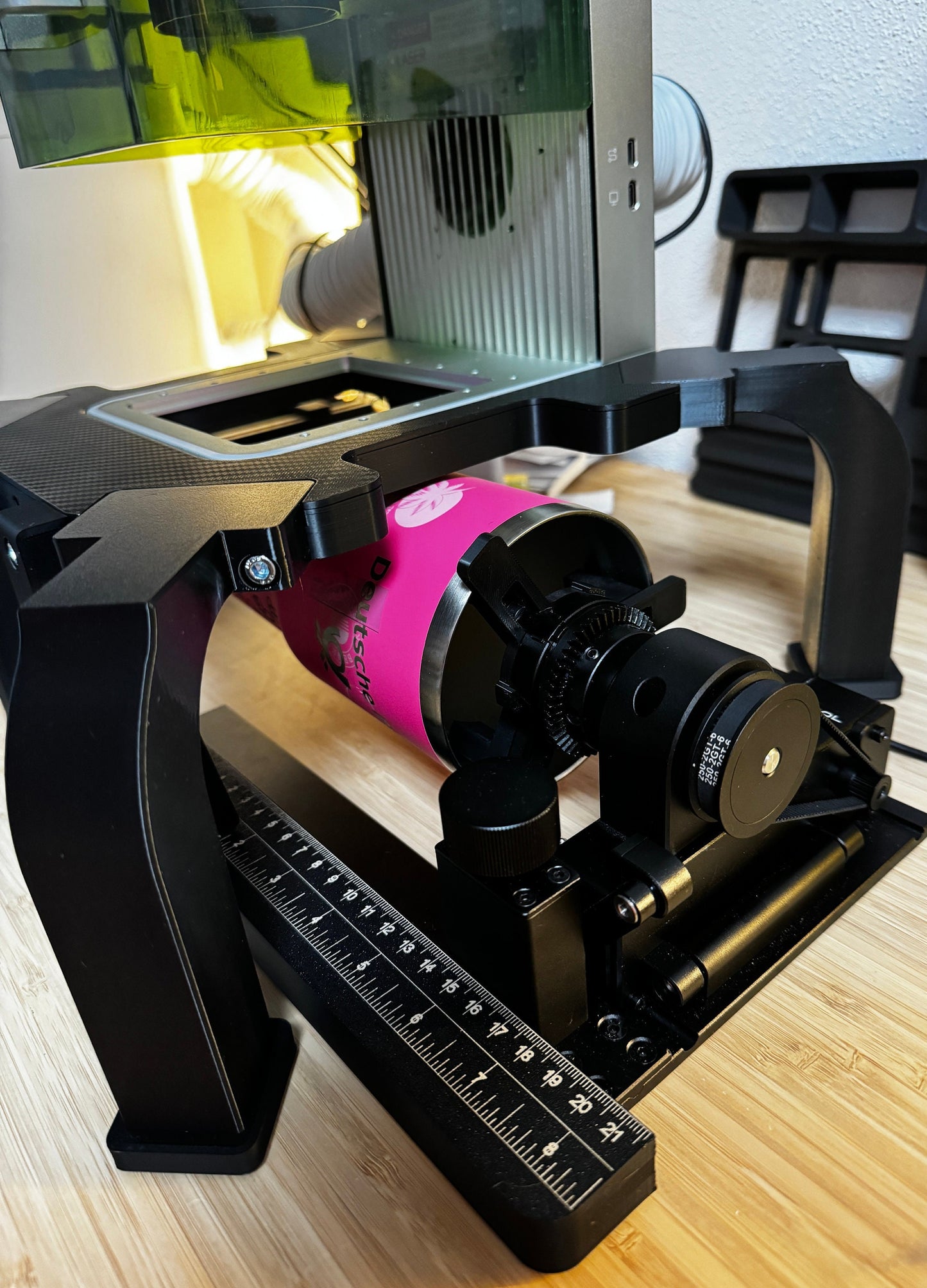 Xtool F1 Riser XL showcasing a large engraving setup for cups and tumblers.