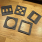 xTool F1 Jigs Set displaying 6 gray base plates for laser engraving projects on a wooden surface.