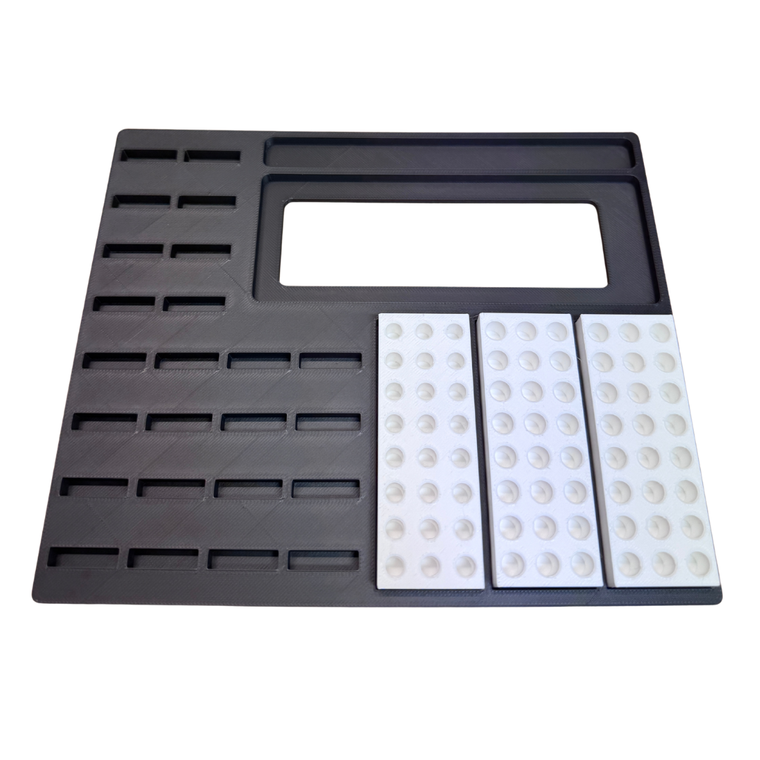 Organizer für The Jigmaker Zubehör mit mehreren Fächern für effiziente Aufbewahrung und Zugriff.