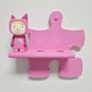 Tonie Wandregal Starterset mit pinkem Puzzle-Regal und Tonie-Figur, perfekte Aufbewahrungslösung für Kinderzimmer.