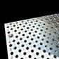 xTool F2 Ultra Jigmaker fixture plate showing a grid of holes for precision setups