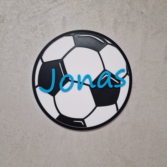 Personalisierbares Fußball-Türschild mit dem Namen Jonas auf einem Fußball-Design für das Kinderzimmer.