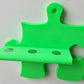 Tonie Puzzle-Erweiterung für 3 Figuren – Flexible Wandregal Ergänzung in 15 Farben, grüne Puzzleform mit Ablage.