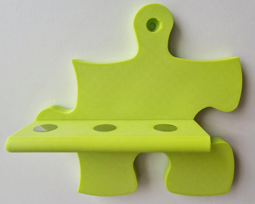 Tonie Puzzle-Erweiterung für 3 Figuren – Flexible Wandregal Ergänzung in 15 Farben, gelb-grünes Puzzle-Design.
